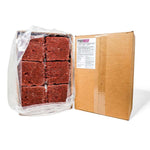 Open RawFedK9 PMR Beef product box with patties visible inside and packaging shown in the background on a white surface, highlighting convenient, balanced raw food packaging for dogs.