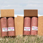 RawFedK9 PMR Pork and Chicken 5lb chubs packed in shipping boxes, ready for delivery of premium raw dog food.