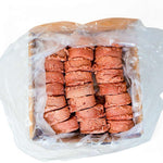 RawFedK9 3oz PMR medallions neatly packed inside their shipping box, ready for delivery of fresh raw dog food.