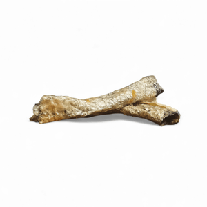 RawFedK9 rolled salmon skin chews displayed on a white background, featuring natural, omega-3 rich single-ingredient treats for dogs.