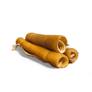 RawFedK9 rolled pork skin chews displayed on a white background, featuring natural, long-lasting single-ingredient chews for dogs.