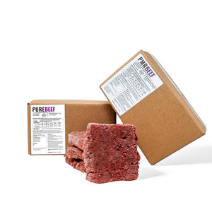 Small transition case featuring RawFedK9 Pure Beef and PMR Beef boxes with beef patties displayed in front, showcasing raw dog food variety.